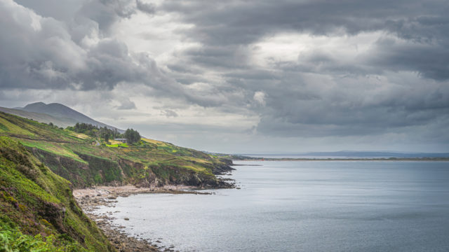 cliffs-beautiful-coastline-and-inch-beach-in-a-distance-215124788